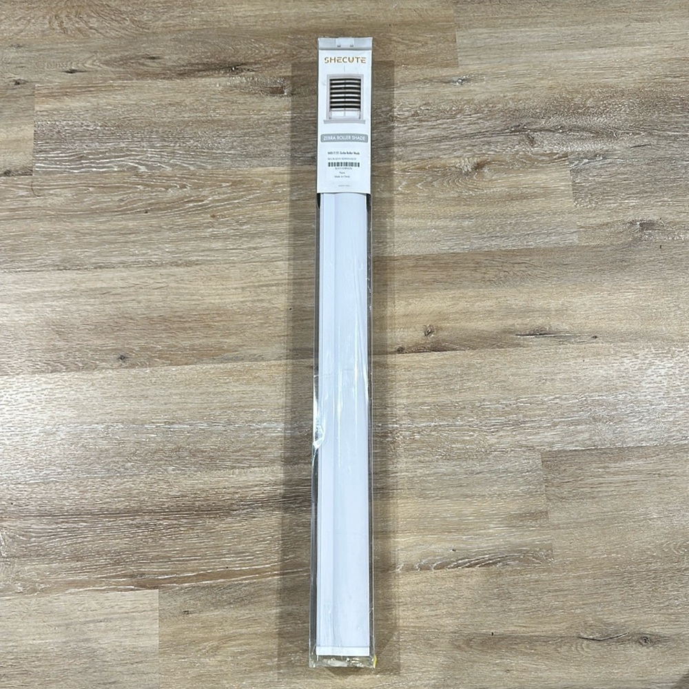 NWT shecute zebra roller shade. 31 in. Wide. Light filtering or blackout.